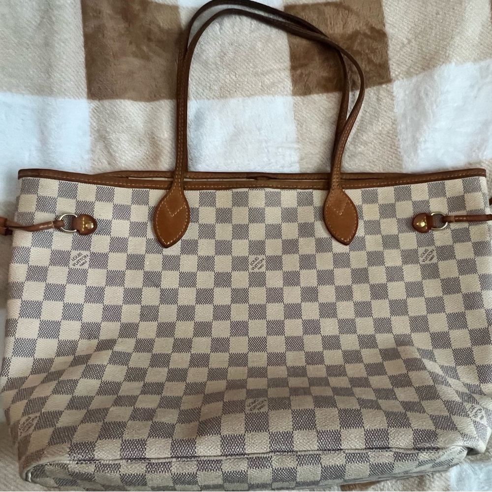 Authentic Louis Vuitton Neverfull Tote PM
White Damier Azur